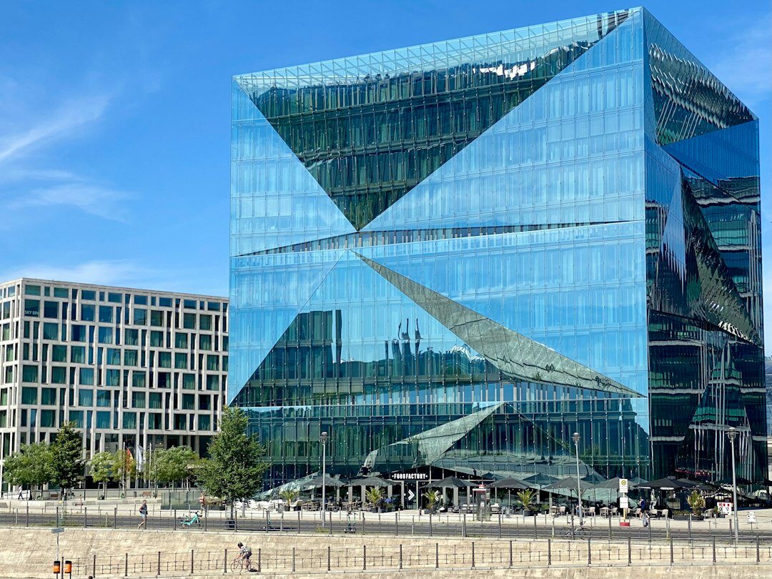 Modern glass office building exterior in a European city