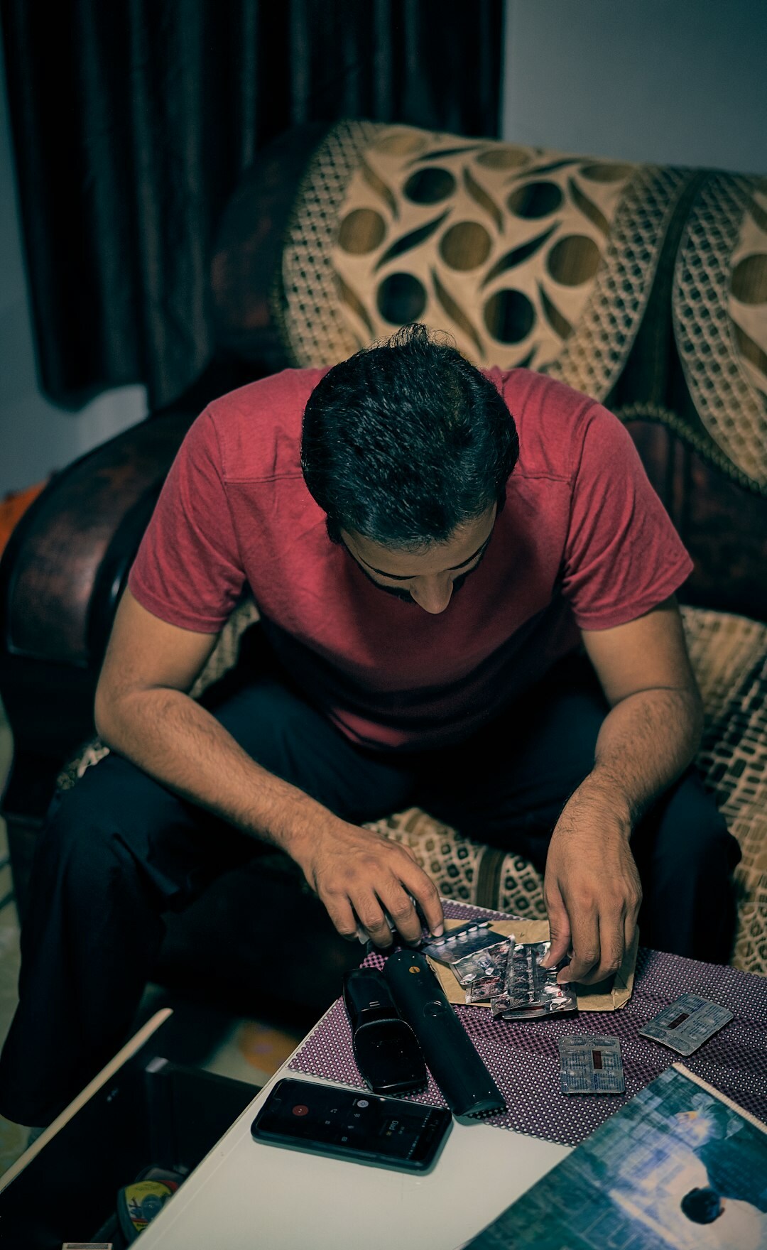 Man analyzing process charts on a laptop screen